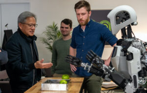 NVIDIA CEO Jensen Huang (left) with Apptronik's Apollo humanoid robot. Source: Apptronik.