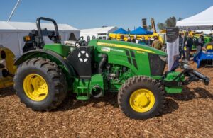 side view of a john deere tractor equipped with bluewhite autonomy package.