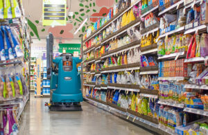 brain corp scrubber scans inventory in retail aisle.