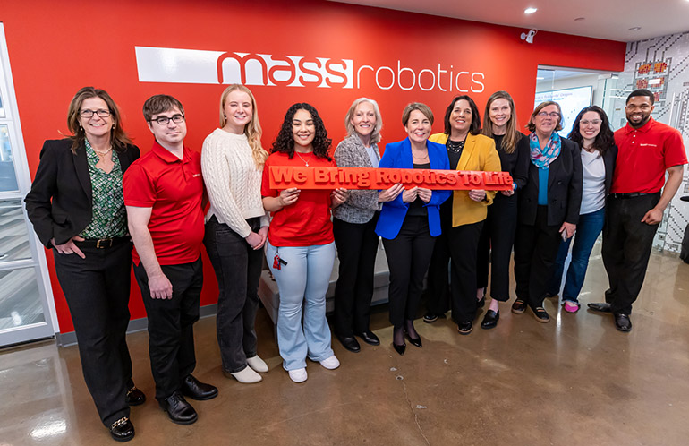 Massachusetts Gov. Maura Healey (center), with Lt. Gov. Kimberly Driscoll, MassTech CEO Carolyn Kirk, Undersecretary of Economic Foundations Ashley Stolba, and MassRobotics' team in Boston.