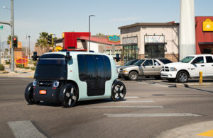 a zoox robo taxi turns a corner in Las Vegas.